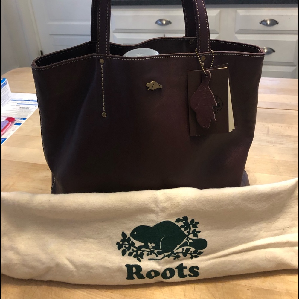 ROOTS Canada genuine leather plum/purple tote.